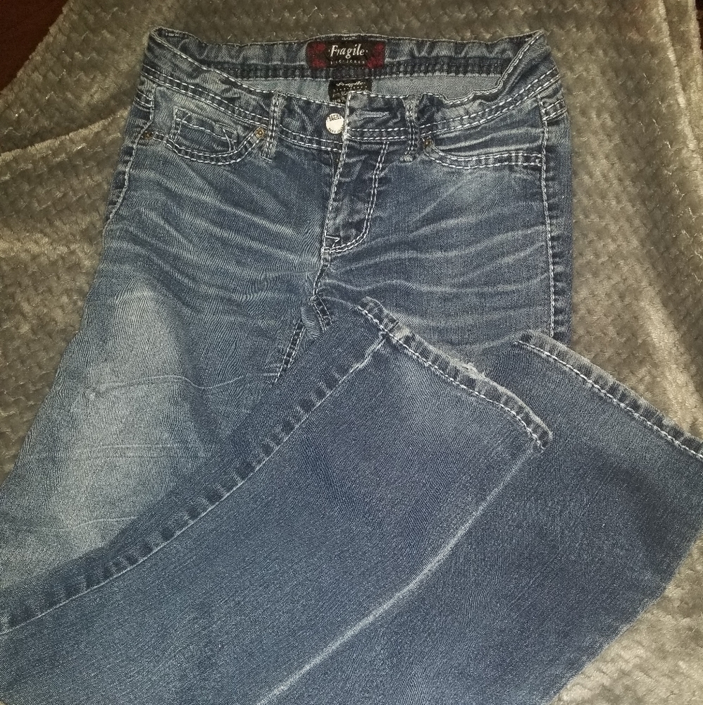 Fragile blue Jeans